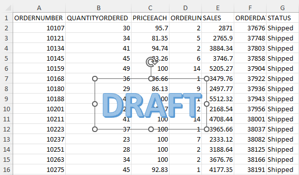 Type the word DRAFT